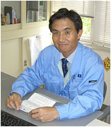 Mr. Nagatomi at his desk